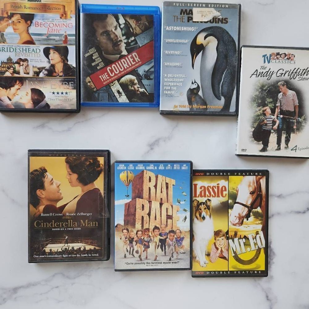 Bundle of seven empty plastic DVD cases rat race Cinderella Man lassie